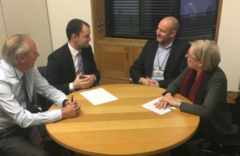 Photo of Luke Hall with representatives from ZSL, TUSK, and the Environmental Investigation Agency